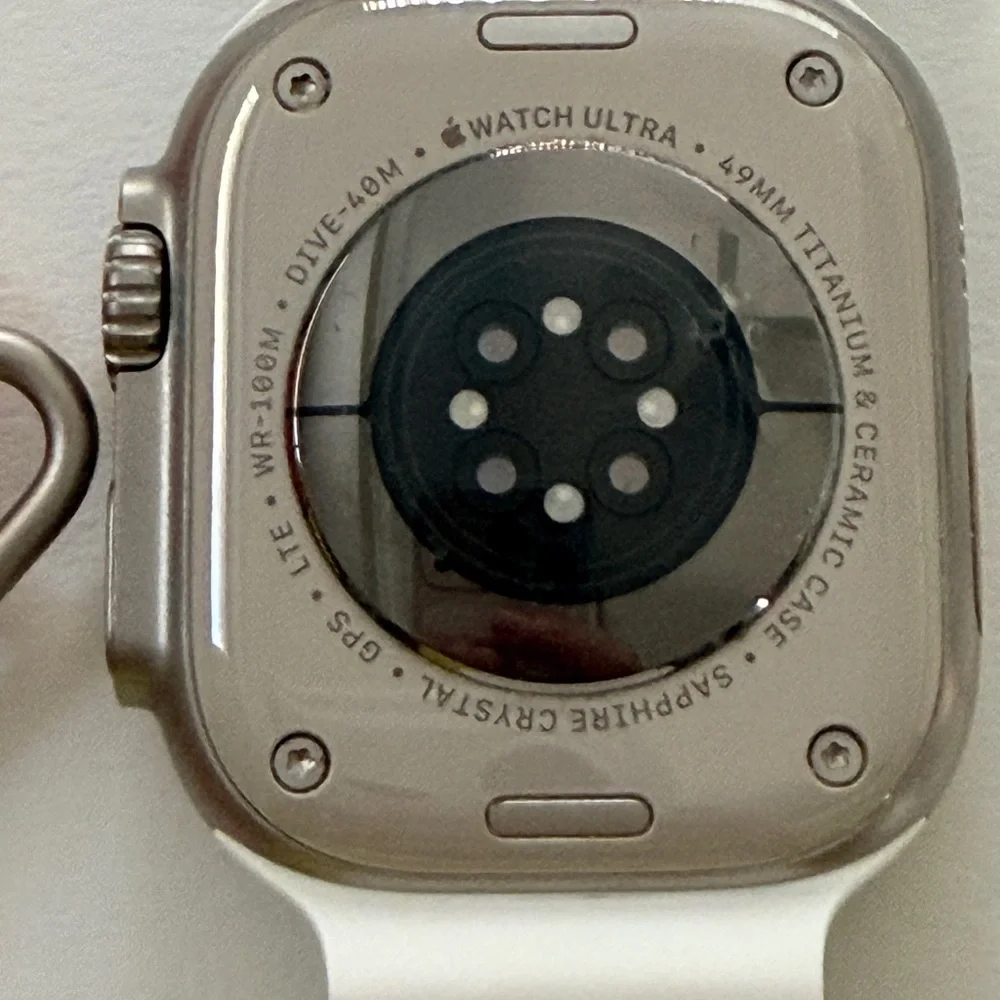 Apple Watch Ultra 1st Gen Smartwatch with White, Orange, and Yellow Bands